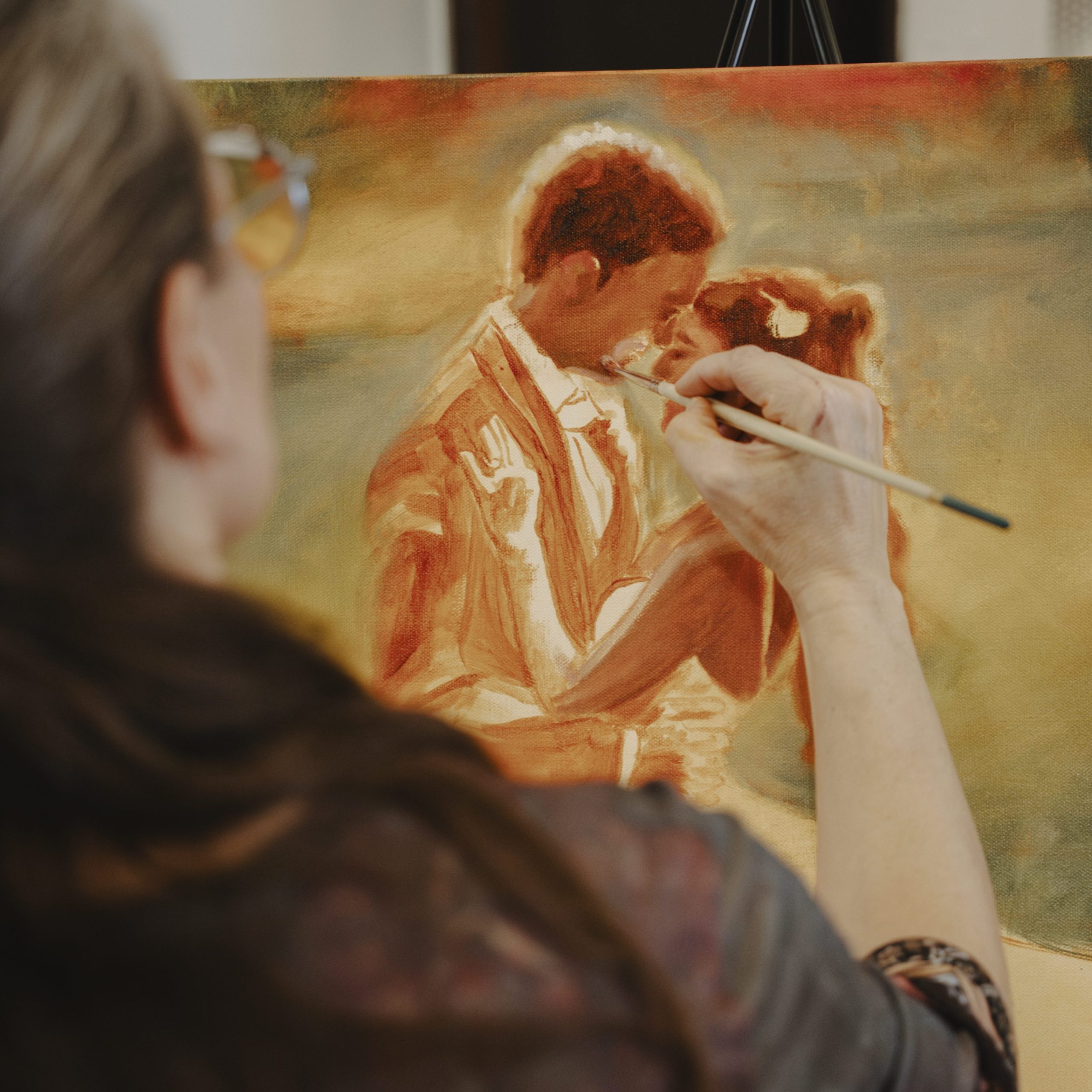 Shanna Cramer working on a live wedding painting